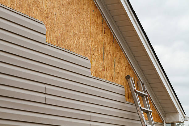 Professional Siding Contractor technician working in Englewood, FL